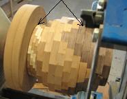 Turn the project around; top against a driver; steady rest on tapered section